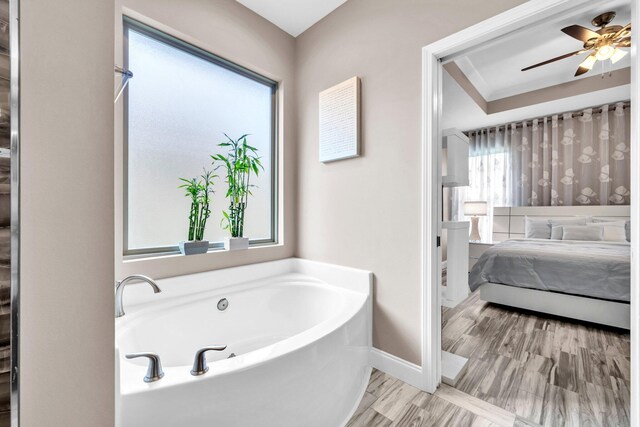 1369 N Beal Ext, Fort Walton Beach, FL 32547 - full bathroom with a bath, ensuite bath, and ceiling fan