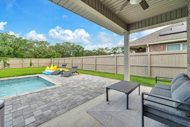 1369 N Beal Ext, Fort Walton Beach, FL 32547 - fenced backyard featuring a ceiling fan, a patio, and an outdoor living space