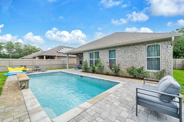 1369 N Beal Ext, Fort Walton Beach, FL 32547 - view of swimming pool featuring a patio and a fenced backyard