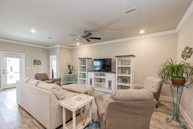 364 Lightning Bug Ln, Freeport, FL 32439 - living area with light wood finished floors, ceiling fan, recessed lighting, and ornamental molding