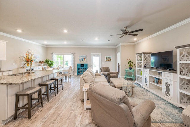 364 Lightning Bug Ln, Freeport, FL 32439 - living area with light wood finished floors, recessed lighting, ceiling fan, and ornamental molding