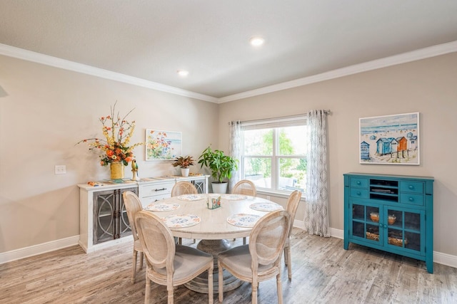 364 Lightning Bug Ln, Freeport, FL 32439 - dining space featuring light wood-style floors, crown molding, and recessed lighting