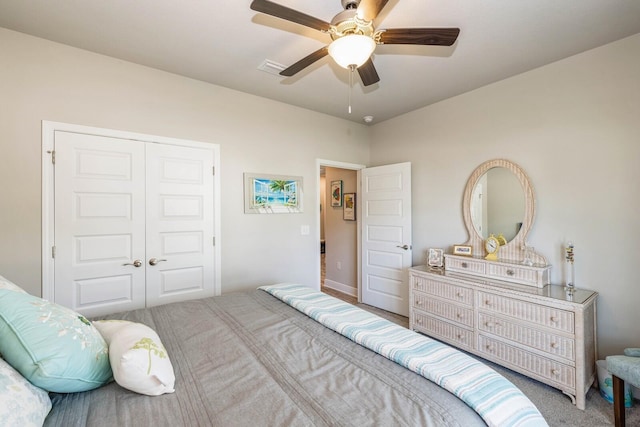 364 Lightning Bug Ln, Freeport, FL 32439 - bedroom featuring a closet, ceiling fan, and carpet