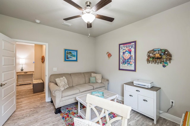 364 Lightning Bug Ln, Freeport, FL 32439 - living area with light wood-style floors and ceiling fan