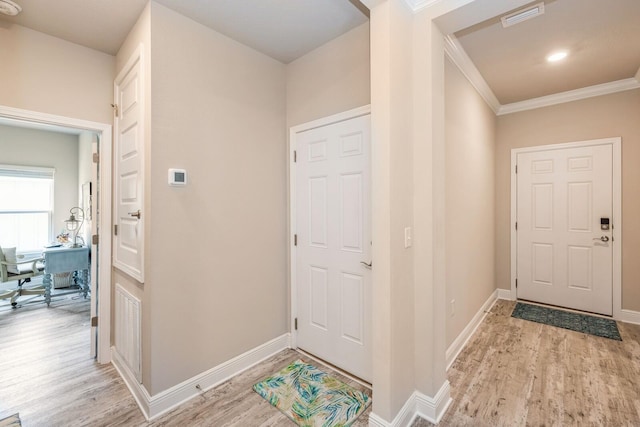364 Lightning Bug Ln, Freeport, FL 32439 - foyer featuring light wood-style floors and crown molding