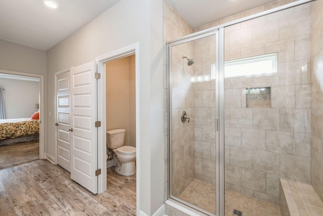364 Lightning Bug Ln, Freeport, FL 32439 - full bath featuring ensuite bath, a shower stall, and wood finished floors
