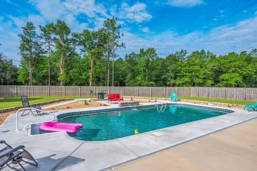 2405 Dakota Way, Crestview, FL 32536 - view of swimming pool featuring a patio area and a fenced backyard