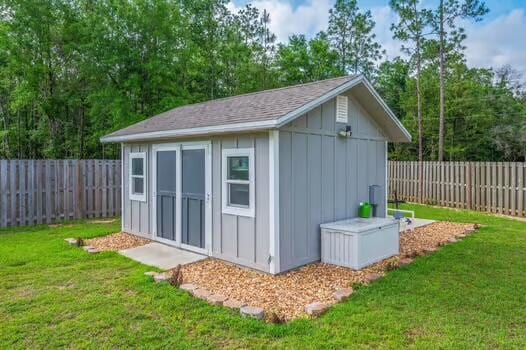 2405 Dakota Way, Crestview, FL 32536 - view of shed featuring a fenced backyard