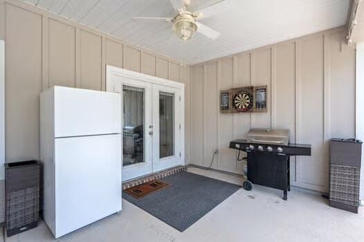2405 Dakota Way, Crestview, FL 32536 - entrance to property featuring french doors, board and batten siding, and a ceiling fan