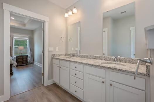 2405 Dakota Way, Crestview, FL 32536 - full bathroom with wood finished floors and double vanity