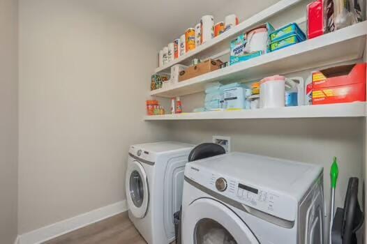 2405 Dakota Way, Crestview, FL 32536 - laundry room with independent washer and dryer and wood finished floors