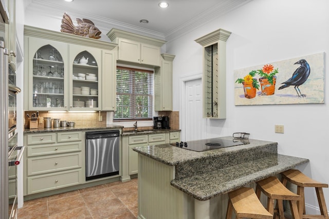 176 Rue Martine, Miramar Beach, FL 32550 - kitchen with stainless steel dishwasher, black electric stovetop, a peninsula, a kitchen bar, and decorative backsplash