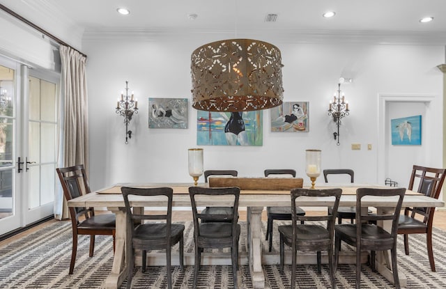 176 Rue Martine, Miramar Beach, FL 32550 - dining area featuring recessed lighting, ornamental molding, french doors, and wood finished floors