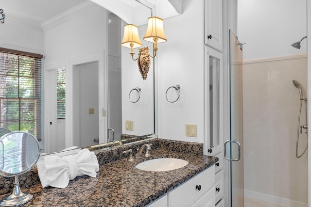 176 Rue Martine, Miramar Beach, FL 32550 - bathroom featuring a shower stall, vanity, and ornamental molding