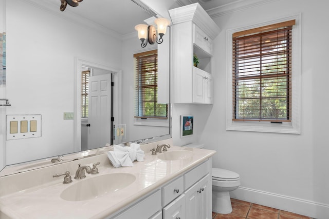 176 Rue Martine, Miramar Beach, FL 32550 - bathroom with double vanity, tile patterned floors, and crown molding
