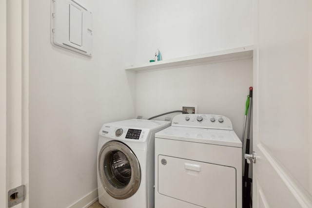 234 Grande Pointe Cir, Inlet Beach, FL 32461 - laundry area with washing machine and clothes dryer and electric panel