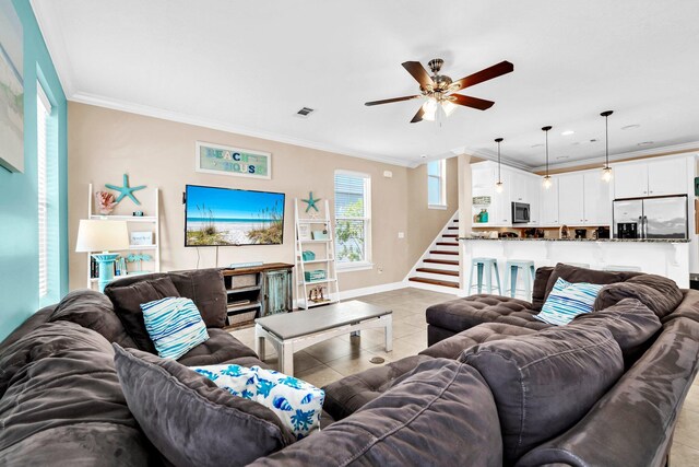 211 Tahitian Way, Destin, FL 32541 - living room with stairs, ceiling fan, crown molding, light tile patterned floors, and recessed lighting