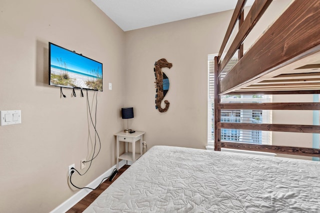 211 Tahitian Way, Destin, FL 32541 - bedroom featuring dark wood finished floors and baseboards