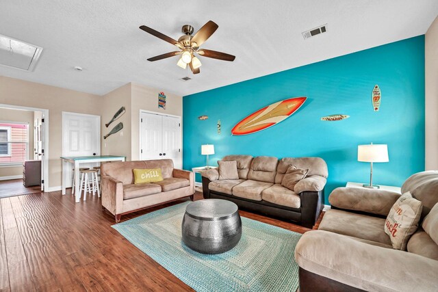211 Tahitian Way, Destin, FL 32541 - living area featuring wood finished floors, ceiling fan, and attic access