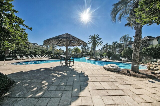 211 Tahitian Way, Destin, FL 32541 - community pool with a patio area