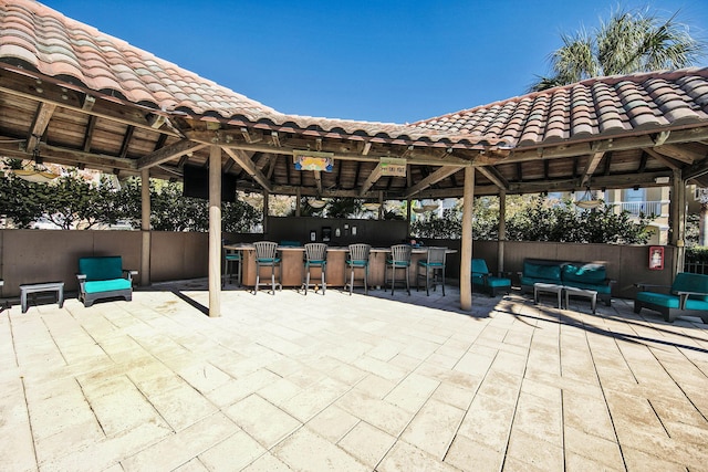 211 Tahitian Way, Destin, FL 32541 - view of patio / terrace with a gazebo and outdoor lounge area