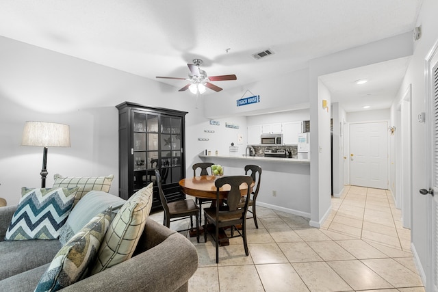 200 Sandestin Ln Apt 1209, Miramar Beach, FL 32550 - dining area with ceiling fan and light tile patterned floors