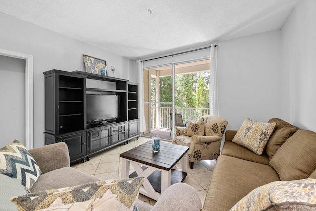200 Sandestin Ln Apt 1209, Miramar Beach, FL 32550 - living area with light tile patterned flooring and a textured ceiling