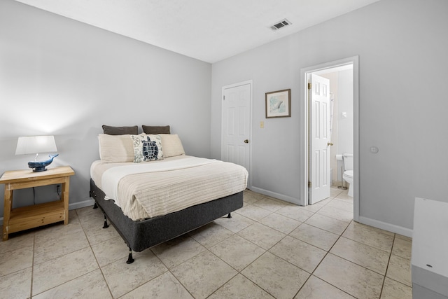200 Sandestin Ln Apt 1209, Miramar Beach, FL 32550 - bedroom with light tile patterned floors and ensuite bathroom