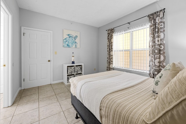 200 Sandestin Ln Apt 1209, Miramar Beach, FL 32550 - bedroom with light tile patterned floors and baseboards