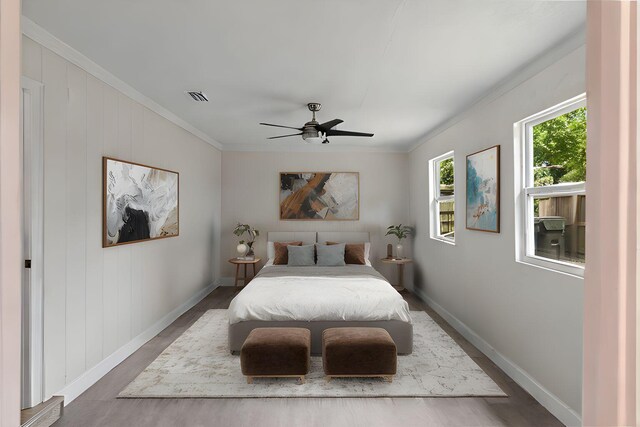1023 W Webster Dr, Pensacola, FL 32505 - bedroom featuring crown molding, wood finished floors, and ceiling fan