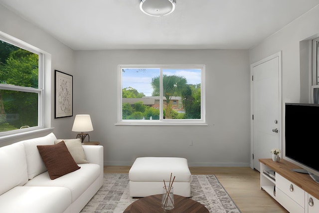 1023 W Webster Dr, Pensacola, FL 32505 - living area with light wood-style floors and baseboards