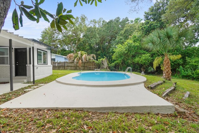 1023 W Webster Dr, Pensacola, FL 32505 - view of swimming pool with a patio area