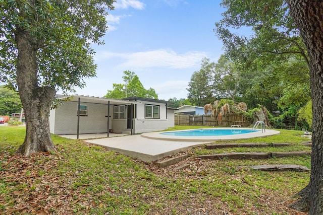 1023 W Webster Dr, Pensacola, FL 32505 - outdoor pool with a patio area and a fenced backyard