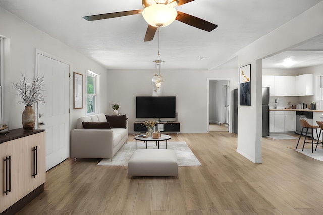 1023 W Webster Dr, Pensacola, FL 32505 - living room featuring light wood-style floors and ceiling fan