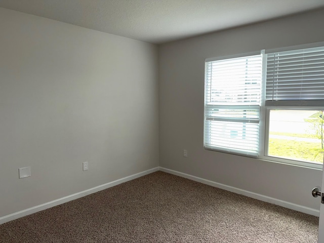 2825 Patriot Ridge Dr, Crestview, FL 32539 - empty room with light carpet and baseboards