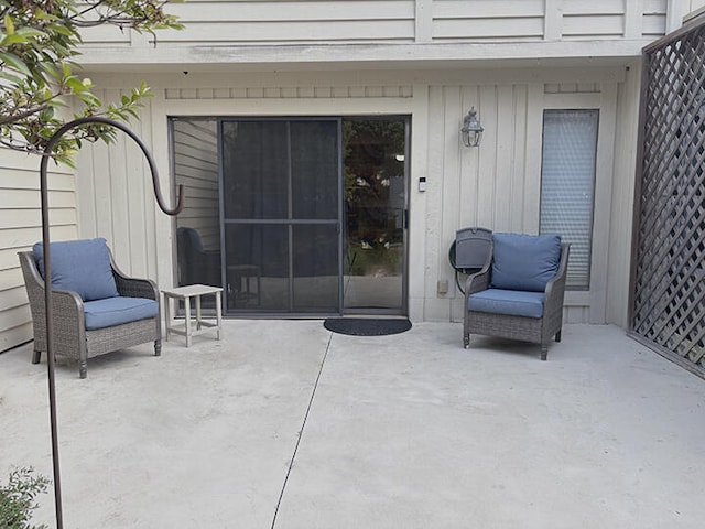 3861 Indian Trl Unit 104, Destin, FL 32541 - property entrance featuring a patio