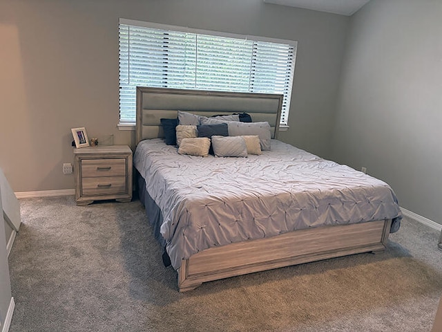 3861 Indian Trl Unit 104, Destin, FL 32541 - carpeted bedroom with baseboards