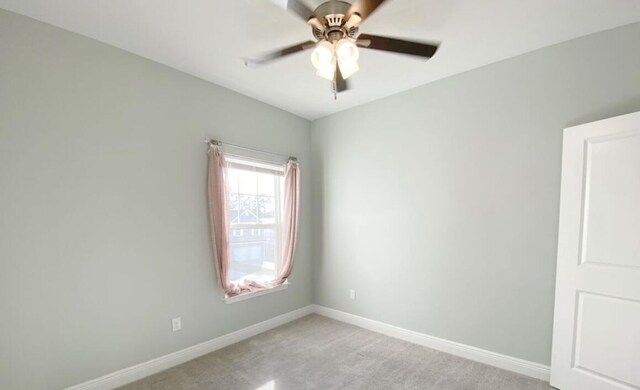 196 Johnson Ct, Crestview, FL 32536 - empty room featuring light colored carpet and a ceiling fan