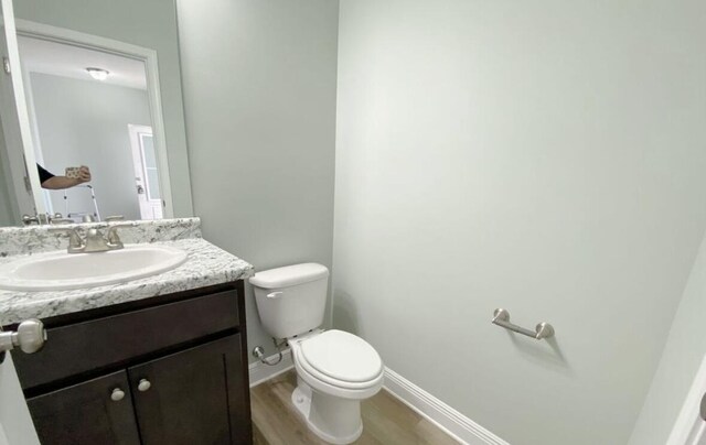 196 Johnson Ct, Crestview, FL 32536 - bathroom with vanity and wood finished floors