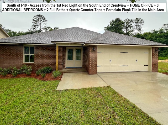 245 Cassady Ln, Crestview, FL 32539 - ranch-style home featuring roof with shingles, brick siding, a garage, and a front yard