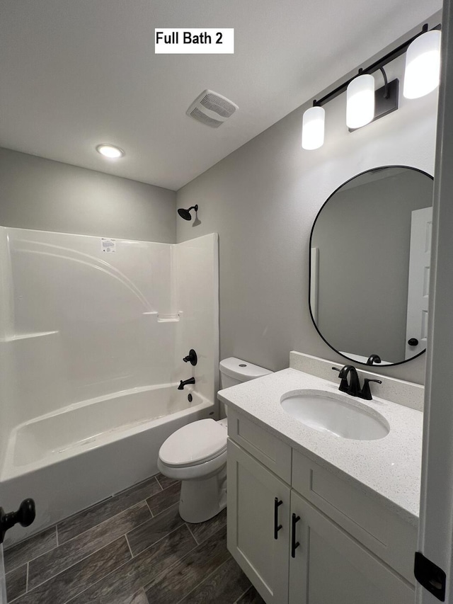 245 Cassady Ln, Crestview, FL 32539 - bathroom featuring vanity,  shower combination, and wood tiled floors