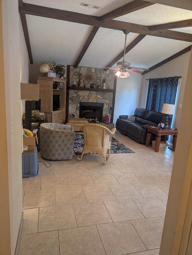 1809 Madelons Path, Fort Walton Beach, FL 32547 - living room featuring a stone fireplace, ceiling fan, and light tile patterned flooring