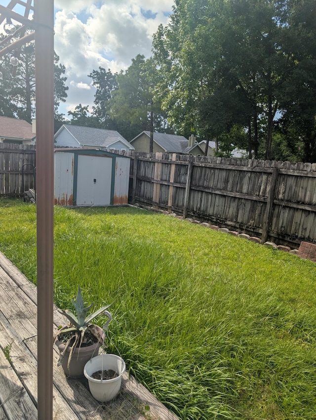 1809 Madelons Path, Fort Walton Beach, FL 32547 - fenced backyard with a storage unit