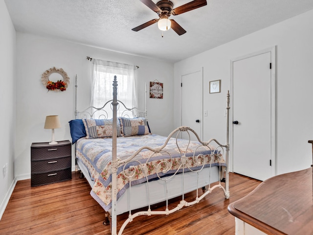 2016 E Three Putt Ln, Panama City, FL 32404 - bedroom featuring wood finished floors and a ceiling fan
