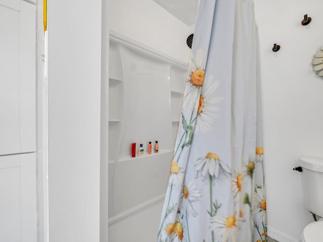2016 E Three Putt Ln, Panama City, FL 32404 - full bath featuring toilet and a shower with shower curtain