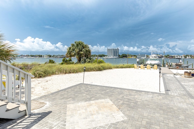 415 Gulf Shore Dr Unit 1, Destin, FL 32541 - view of patio / terrace with a water view