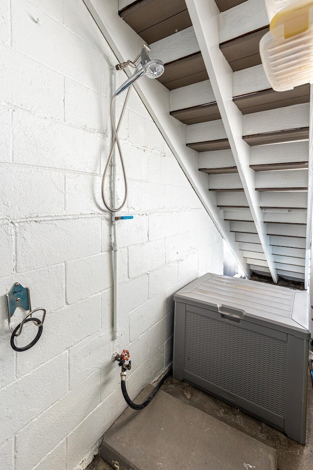 415 Gulf Shore Dr Unit 1, Destin, FL 32541 - basement with concrete block wall