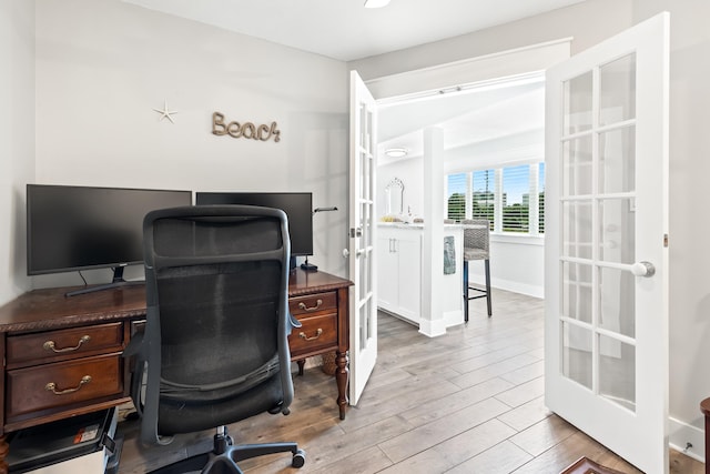 415 Gulf Shore Dr Unit 1, Destin, FL 32541 - home office featuring french doors and wood finished floors