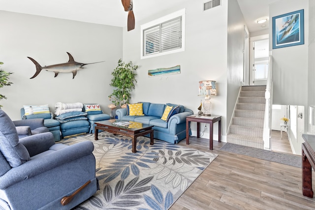 415 Gulf Shore Dr Unit 1, Destin, FL 32541 - living room featuring wood finished floors and stairway