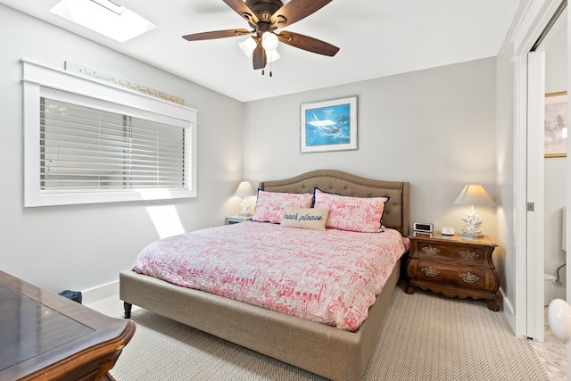 415 Gulf Shore Dr Unit 1, Destin, FL 32541 - carpeted bedroom with a skylight and ceiling fan